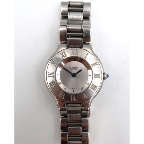 289 - A Ladies Le Must de Carter wristwatch, the silvered dial signed must de Cartier, fitted with blued s... 