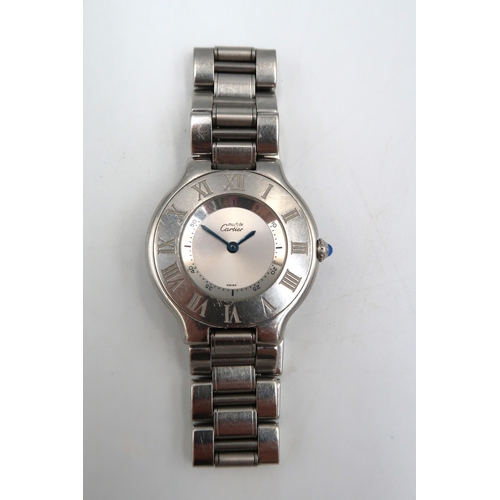 289 - A Ladies Le Must de Carter wristwatch, the silvered dial signed must de Cartier, fitted with blued s... 