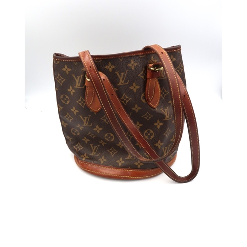 482A - A Louis Vuitton bucket bag - Petit Bucket - Monogram Canvas series with gold-tone hardware and adjus... 