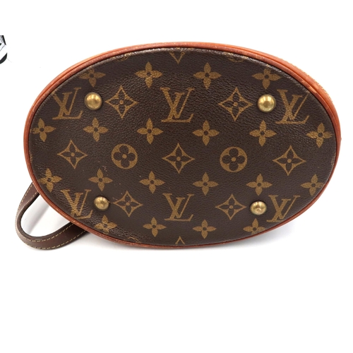 482A - A Louis Vuitton bucket bag - Petit Bucket - Monogram Canvas series with gold-tone hardware and adjus... 