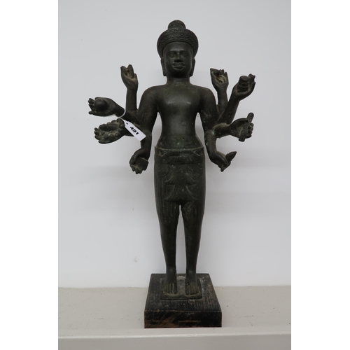 491 - An antique Khmer style standing bronze bayou style Lukeshvara statue, 58cm high, on plinth base