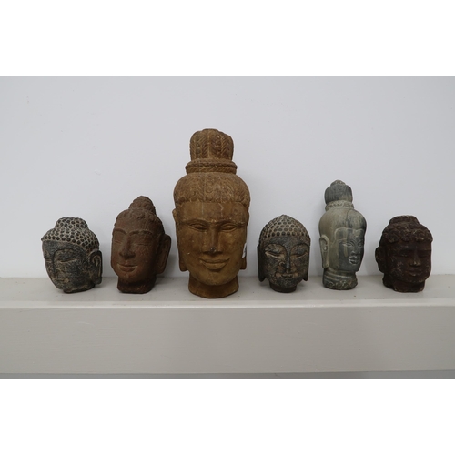 492 - Six stone Buddha heads, different ages and style