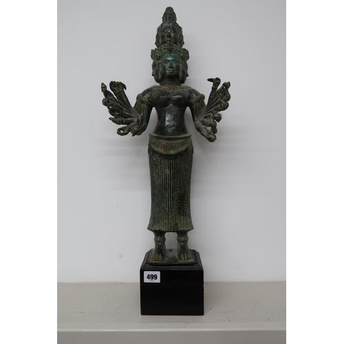 499 - An antique deity statue, Khmer style Bayon Prajuaparamita goddess, on plinth, 65cm high