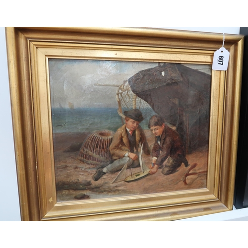 607 - A gilt framed 19th Century English school Oil on Canvas. 'Boys on the shoreline'.33.5cm x 29cm.