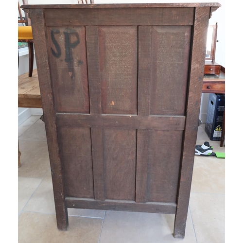 650A - A 20th century Gothic style carved oak two door cabinet - Height 138cm x Width 91cm x Depth 45cm