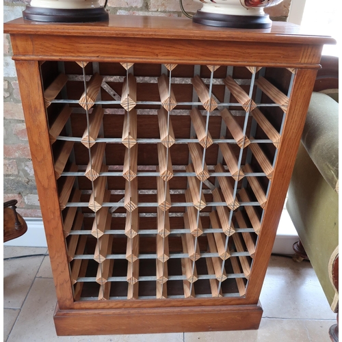 659 - A Modern oak wine rack made by a local craftsman. (New), 110cm high x 71cm deep