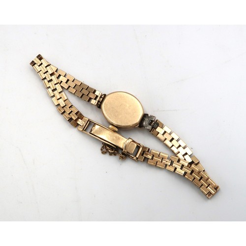 202 - A 9ct yellow gold cased Realm ladies watch on 9ct gold bracelet strap, baton markers to dial with si... 