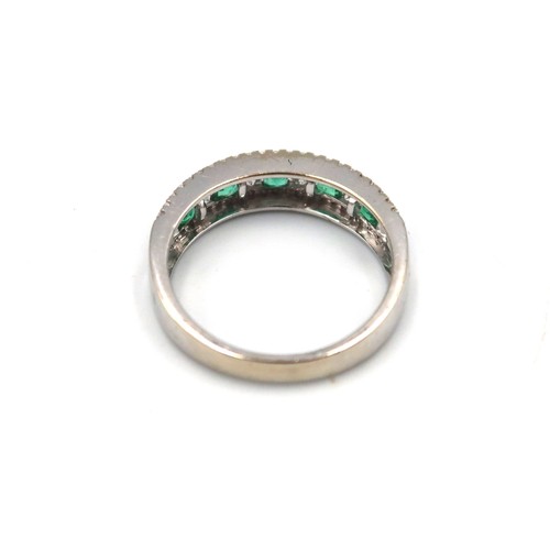 189 - A 9ct white gold emerald and diamond ring - emeralds and diamonds are a good colour and well matched... 