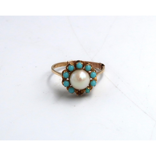 108 - A 9ct yellow gold ring set with a central pearl within a turquoise cabochon surround, one stone miss... 