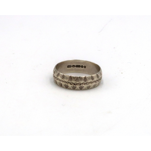 11 - A 9ct white gold wedding band - approx weight 3.6 grams - ring size P - light surface scratches