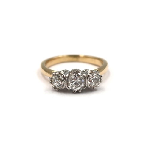 115 - An 18ct yellow gold three stone old cut diamond ring - centre stone approx 0.65ct - total diamond we... 