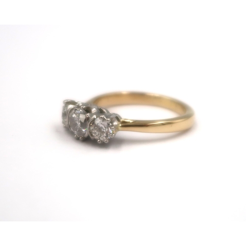 115 - An 18ct yellow gold three stone old cut diamond ring - centre stone approx 0.65ct - total diamond we... 