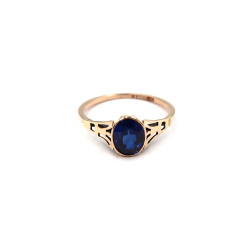 123 - A 9ct yellow gold Arts and Crafts sapphire ring - sapphire is a good colour - head size approx 7mm x... 