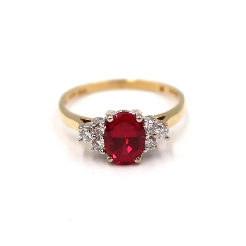 125 - An 18ct yellow gold red tourmaline (rubellite) and diamond ring - the rubellite is a good colour, di... 