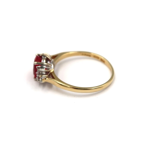 125 - An 18ct yellow gold red tourmaline (rubellite) and diamond ring - the rubellite is a good colour, di... 