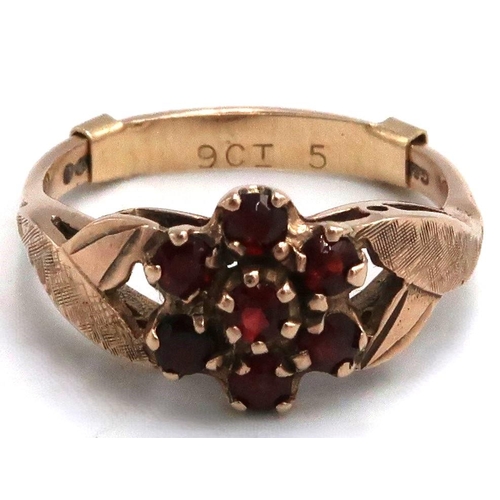 15 - A 9ct marked yellow gold garnet cluster ring, Size O 3.4grams.