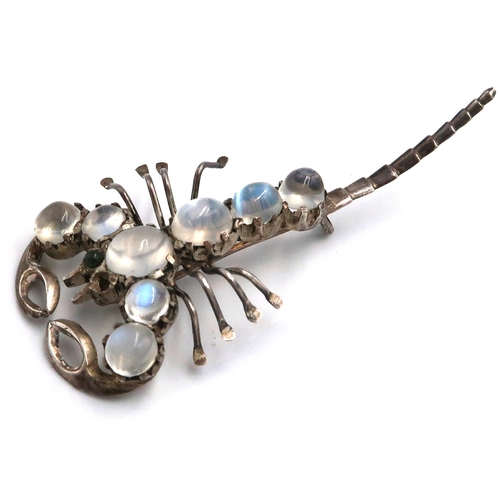 18 - A white metal brooch in the form of a Scorpion, moonstones to spine, approx. 6cm long, overall good ... 