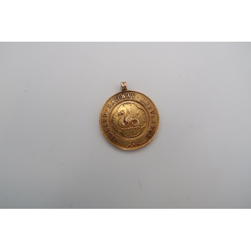 183 - A 15ct yellow gold medallion - approx weight 12.2 grams