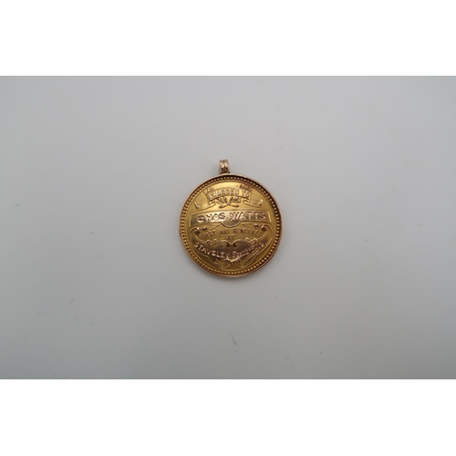 183 - A 15ct yellow gold medallion - approx weight 12.2 grams