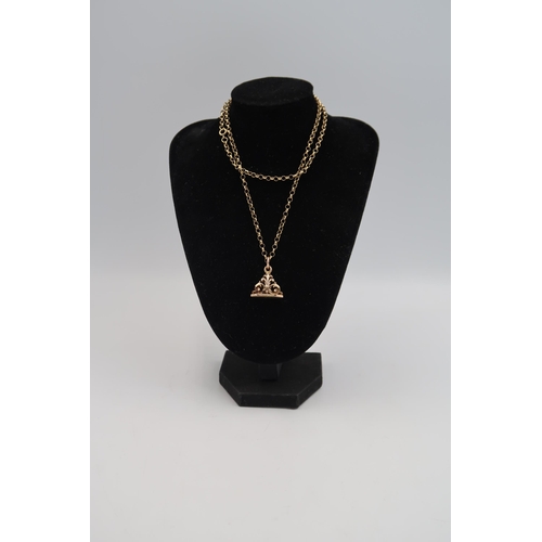 187 - A stamped 9ct yellow gold belcher chain with a 9ct gold seal suspended - approx weight 14.1 grams