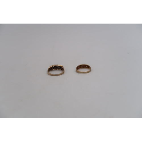 190 - Two 9ct yellow gold stamped rings - one with knotted rope design to shoulder, one with three small g... 