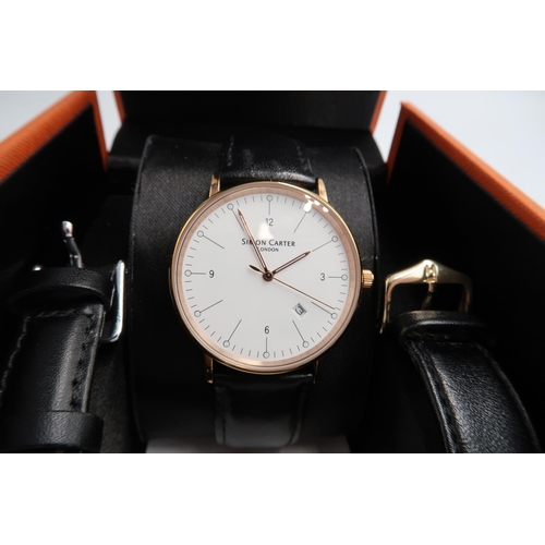 252 - A modern rose gold watch by Simon Carter with date - in working order - an Ingersol wind up watch - ... 