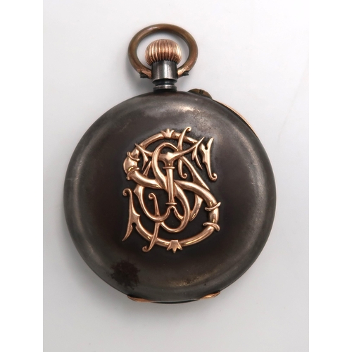 254 - A pocket watch in gun metal case with compensated barometer and another pocket watch