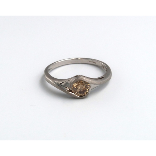 30 - An 18ct gold brilliant cut 'champagne' diamond single stone ring. Stated diamond weight 0.50ct. Size... 