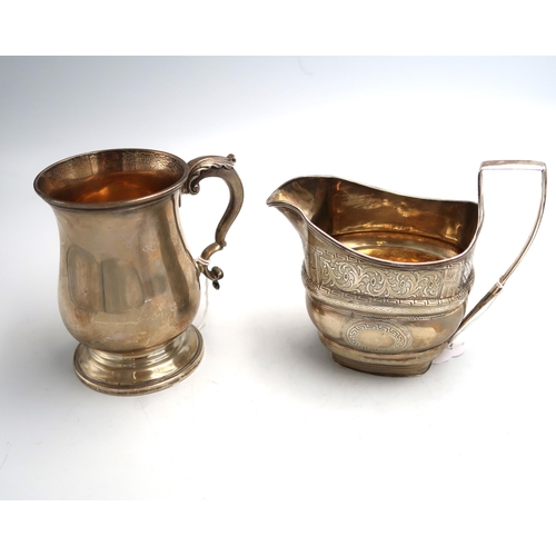 328 - A Silver H.M. Tankard, London 1905 6.8 Troy Oz and a Silver H.M. milk jug with foliate engraved deco... 