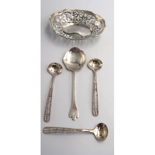 348 - A Silver H.M. bon bon dish with pierced decoration, three H.M. Silver mustard spoons and one other s... 