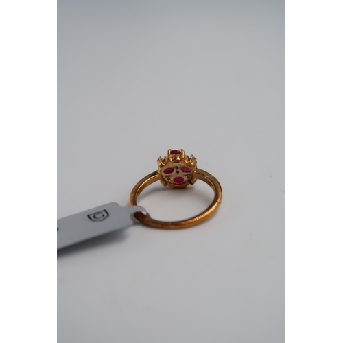 35 - A set of 9ct gold oval ruby, zircon and diamond jewellery to include a necklace, bracelet, earrings ... 