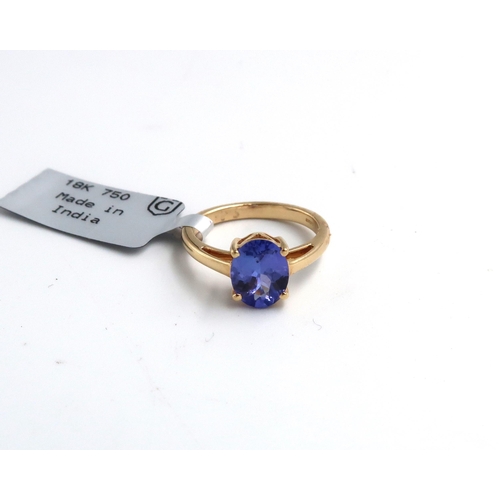 36 - An 18ct gold oval tanzanite single stone ring. Size J 1/2. Stated weight 1.75cts. Weight 3.11 grams.