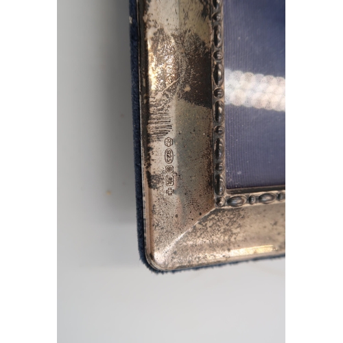 365 - A hallmarked silver photo frame - 21cm x 16cm