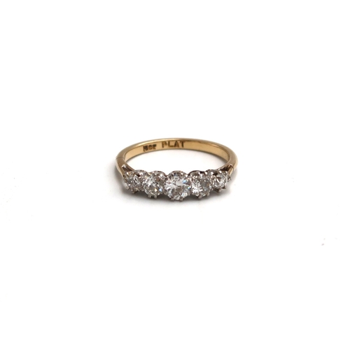 39 - An old cut diamond graduated five stone ring. Estimated total weight 0.80ct. Estimated H/I SI. Size ... 