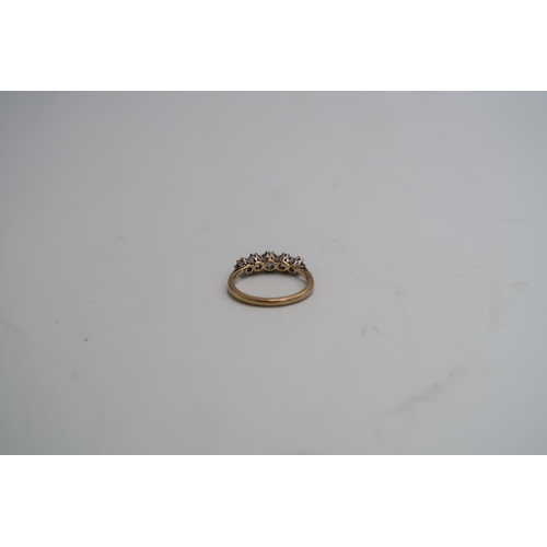 39 - An old cut diamond graduated five stone ring. Estimated total weight 0.80ct. Estimated H/I SI. Size ... 