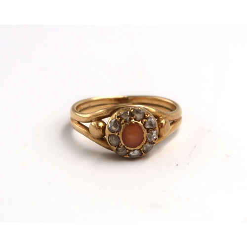 40 - A late 19th/ early 20th century oval coral and rose cut diamond cluster ring. Stamped 18ct. Size K 1... 