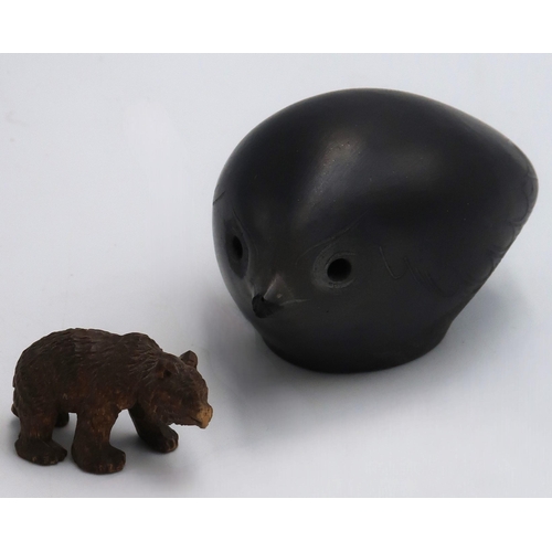 438 - A Treen New Zealand Wren or Rifleman, missing tip to beak, and a small hand carved black forest bear... 