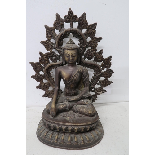 443 - A cast yellow metal figure of a Sinto-tibetan kneeling buddha 38cm high, in good condition