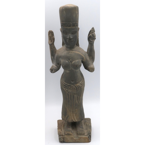 453 - an antique black stone figure, khmer Origin sculpture. 33cm high, in good condition