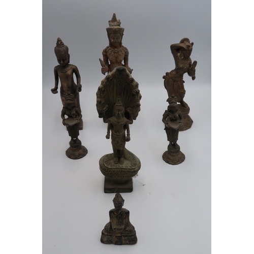 459 - A group of Indo-Chinese deity figures including dancing apsara, a metal statue of a Khmer standing f... 