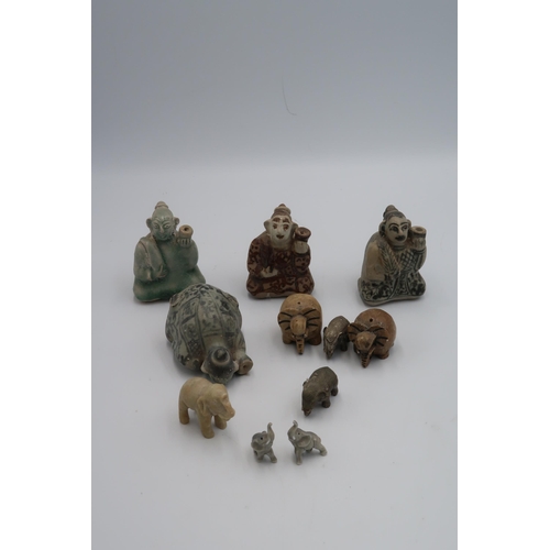 467 - Four Oriental Water droppers, with seven small ceramic and metal animal figures tallest 5cm high, go... 