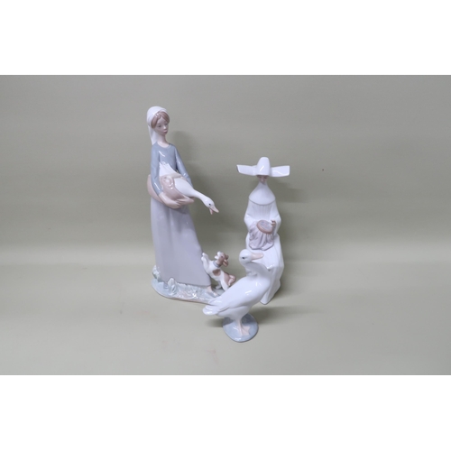 474 - A Lladro girl and goose and dog figurine No 4866, a Lladro Nun sitting sewing embroidery No 5501 and... 