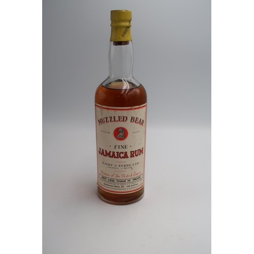 477 - A bottle of Muzzled Bear Fine Jamaica Rum - Rigby & Evans Ltd - not less than 70% proof - sealed, le... 