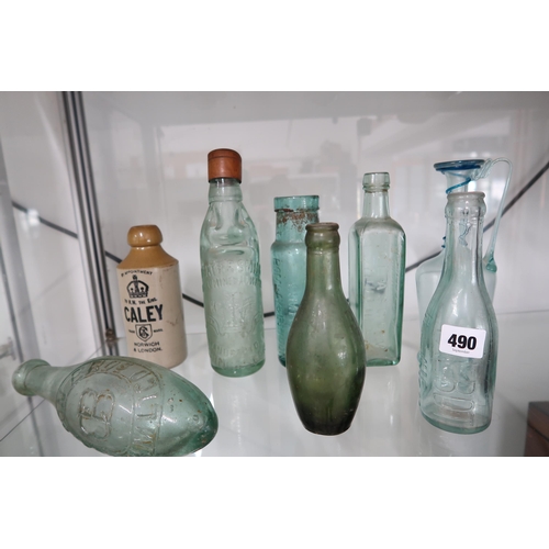 490 - Seven vintage bottles and a Caley Norwich bottle