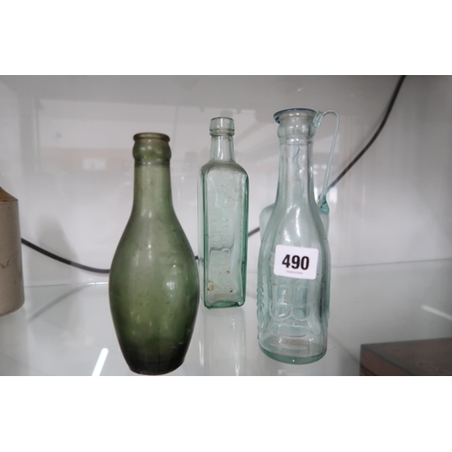 490 - Seven vintage bottles and a Caley Norwich bottle