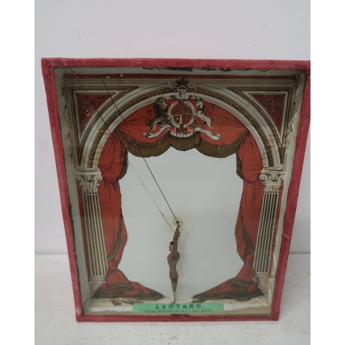 497 - A 19th century Leotard sand toy automation of a trapeze artist with painted decoration in a red case... 