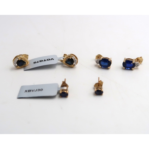 51 - A pair of oval sapphire ear studs, stamped 9k Weight 0.88 grams. A pair of pear shape sapphire and d... 