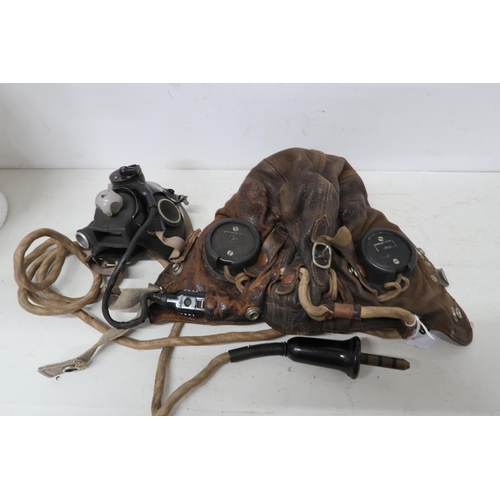 540 - A Lancaster flying helmet with its mask and intercom cable - in worn but reasonable condition - used... 