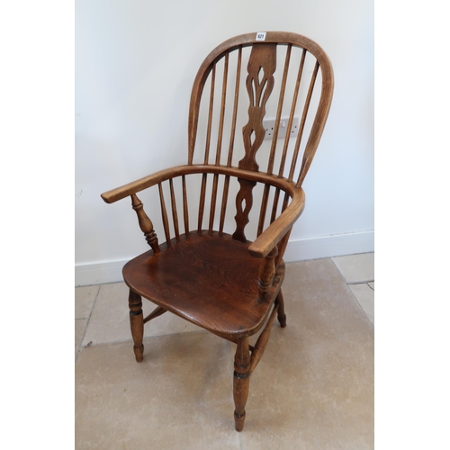 621 - A 19th century ash Windsor armchair - in good condition