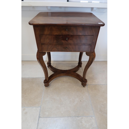 636 - A 19th century flame mahogany ladies sewing table with a rising top over drawers - in good condition... 